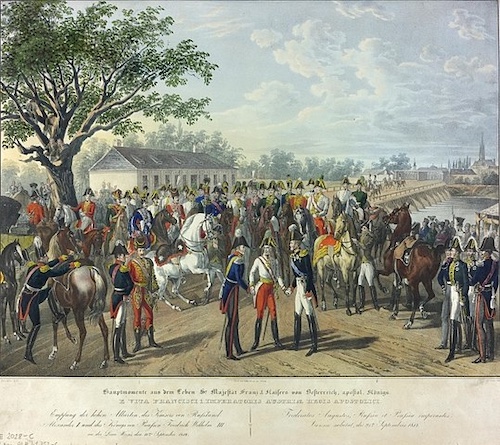 Outdoor painting of a large, pleasant, open area with grass, a prominent tree, and a small water reservoir or pond. The field is crammed with uniformed early 19th century military officers on horseback and on foot. In the foreground, a couple of small groups are standing and talking. Behind them, many mounted officers stand waiting. In the background are three modest-looking buildings. 
Lithograph. Artists: Johann Nepomuk Hoechle (1790–1835) and Franz Wolf (1795–1859). Created 1835. Work location: Vienna. Public domain via Wikimedia Commons.